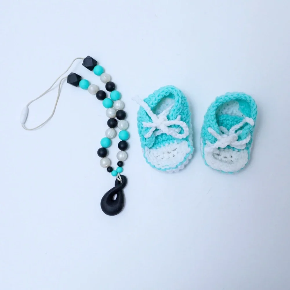 Set of crocheted baby shoes and teal baby teething necklace chewy shower newborn